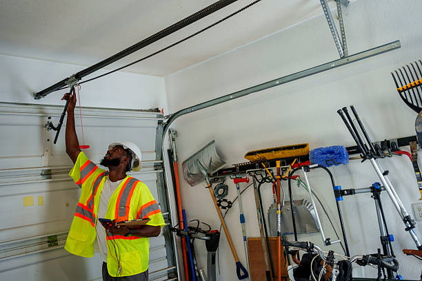 Professional Garage Door Panel Replacement technician working in Freeland, MI